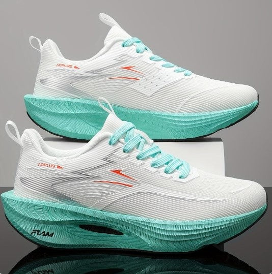 A pair of white running shoes with mint green soles and laces, featuring orange logo details and the brand name 'AIRPLUS' on the side, displayed on a reflective surface against a gray background.